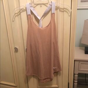 Nike Women's Beige Tank Top with White Straps criss cross in the back.
